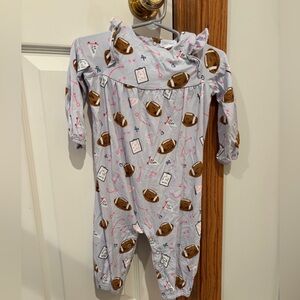 Football romper with ruffle detail